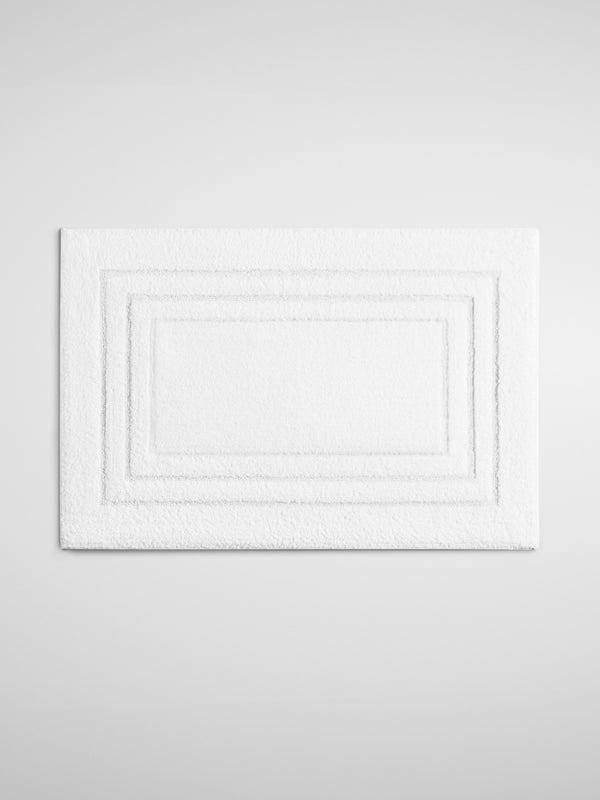 Four Seasons Plush Bath Mat, soft white mat with triple frame design, cozy and luxurious bathroom addition